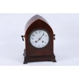 An early 19th Century Regency style rosewood cased bracket clock, arch Gothic shaped, having white