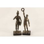 A pair of Spelter figures with a Roman centurion and an athlete.