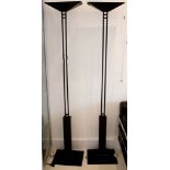 A pair of black finished floor standing uplighters, in the manner of Mackintosh.
