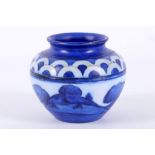 AN EARLY 20TH CENTURY WILLIAM MOORCROFT MINIATURE ROUND VASE, in blue and white in 'Dawn' pattern,