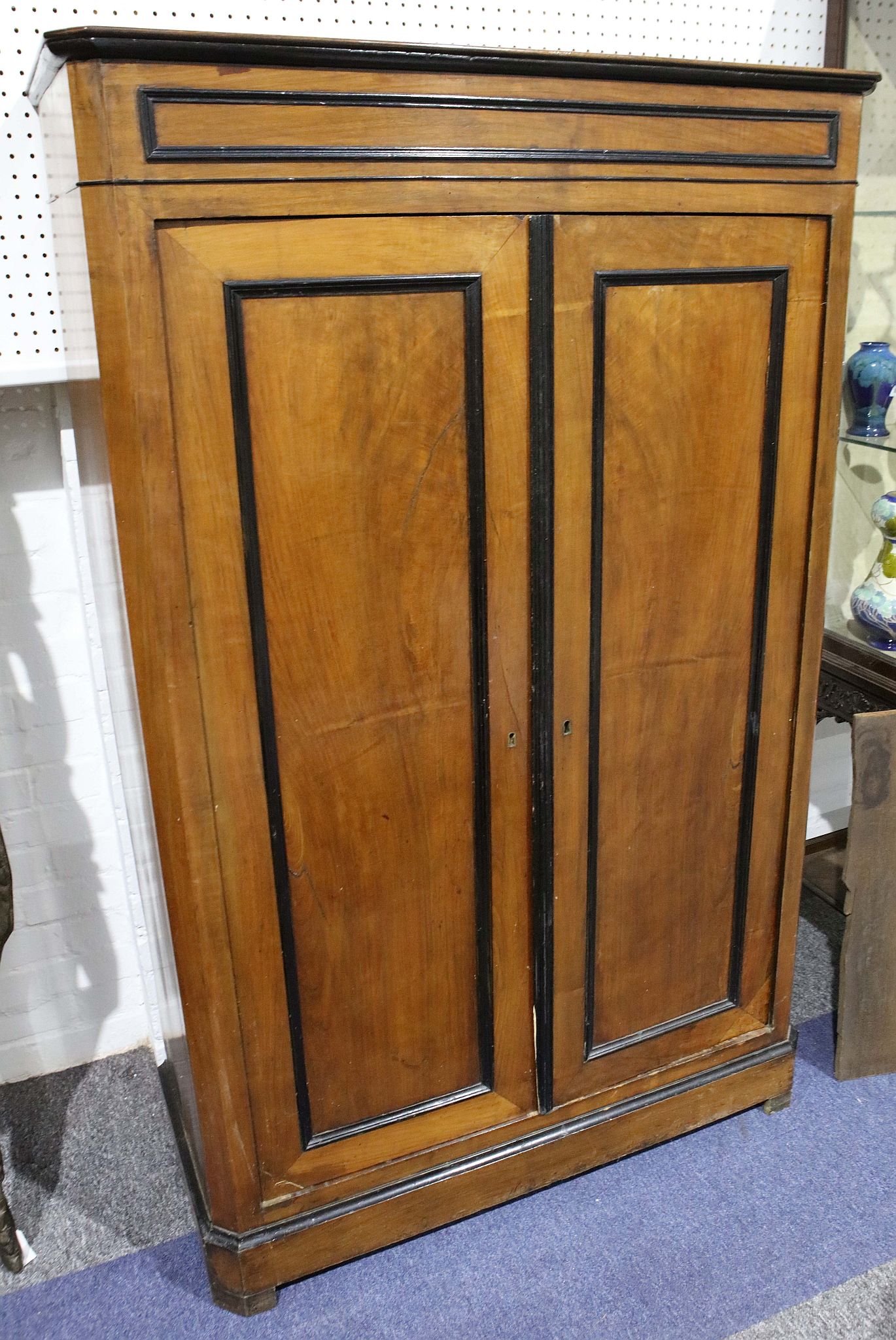 A 19th Century walnut and ebonised two door side cabinet