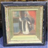 An oil painted portrait of a martyred saint in a gilt and ebonised frame. 23x19cm