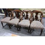 A set of eight Victorian mahogany dining chairs on turned legs