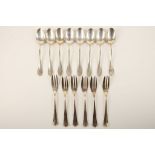 A set of  eight .800 Silver teaspoons, together with six white metal pastry forks.