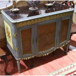 A french cammode chest having painted finish with gilt embellishment and marquetry inlaid door