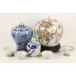 A group of Chinese and Japanese porcelain comprising a figurative ginger jar, a pair of 'sweet meat'