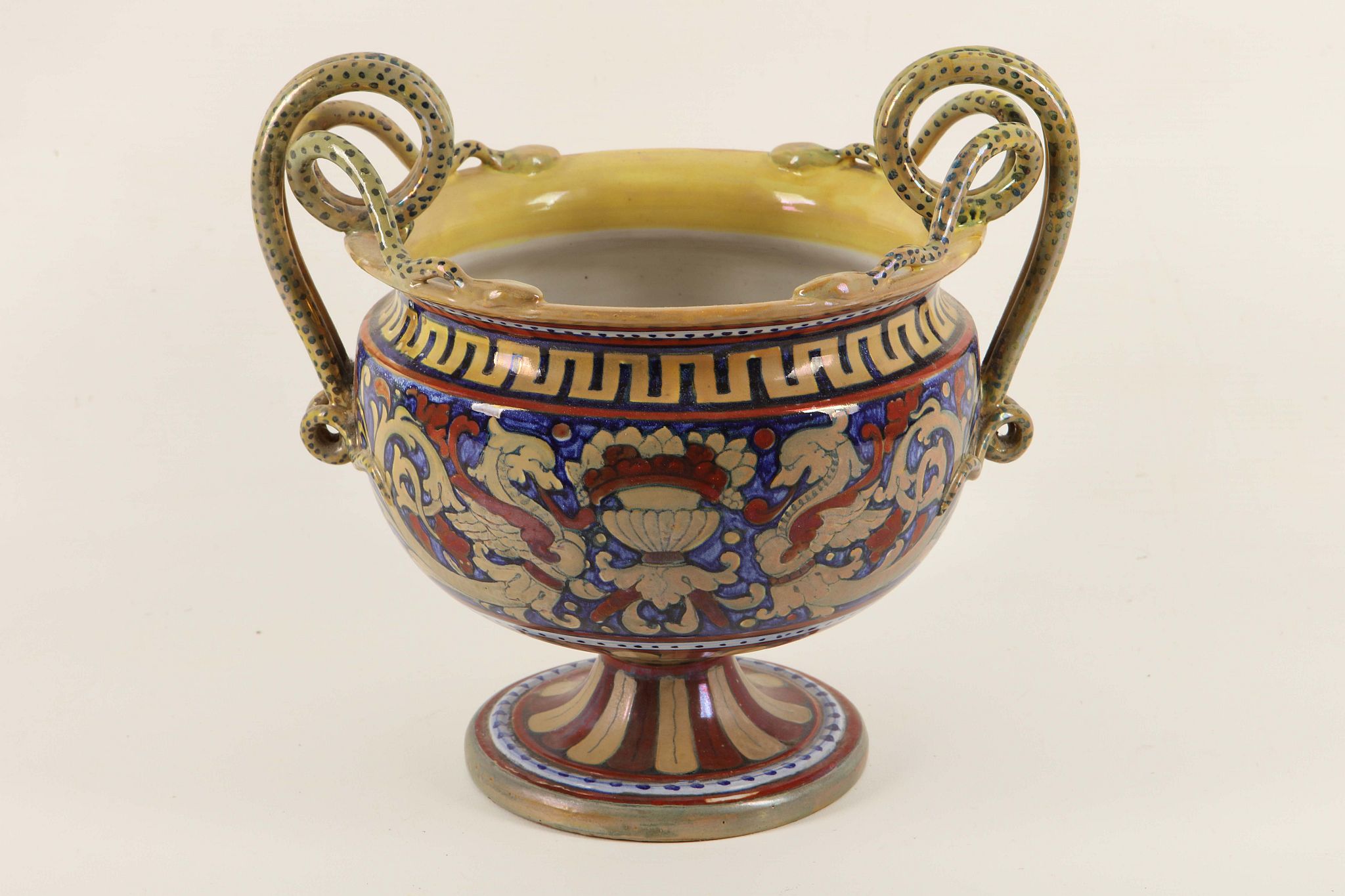 A 19th Century Italian majolica vase with twin snake handles, decorated in lustrous glazes in - Image 2 of 4