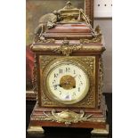 A late 19th Century French mahogany and brass mantel clock, with platform movement