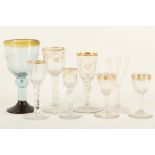 An interesting collection of early wine and cordial glasses, to include a small plain stem wine