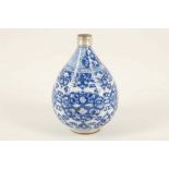 A Chinese blue and white pear shaped vase with European silver mount, 15cm high.