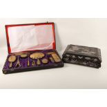 A cased faux tortoishell dressing set, with original gilt decoration, together with black