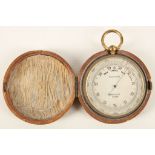 An early 20th Century pocket compensated barometer, retailed by Harrods Ltd, London, in leather