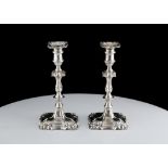 Pair of late Victorian Sterling Silver candlestick by Goldsmiths & Silversmiths, London 1899. The