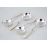 Set of four Antique George V Sterling Silver fruit spoons by Martin, Hall & Co, Sheffield 1931. With