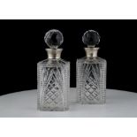 Pair of Sterling Silver mounted cut glass decanters by A Chick & Sons Ltd, London 1977. Of octagonal