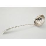 Antique George III Sterling Silver soup ladle marked T E, London 1771. In Old English pattern with