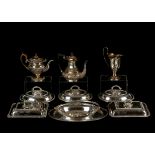 A mixed lot of Antique Silver plated items to include teapots, entree diehes, etc.