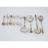 A selection of Antique Sterling Silver spoons to include a pair of late Victorian serving spoons