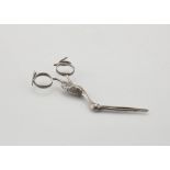 Pair of Antique early 19th Century Silver ribbon pullers probably Dutch c1810. Modeled as a stork,