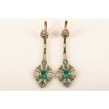 A pair of Art Deco period Russian 14ct gold, emerald and diamond set pendant earrings, the stones