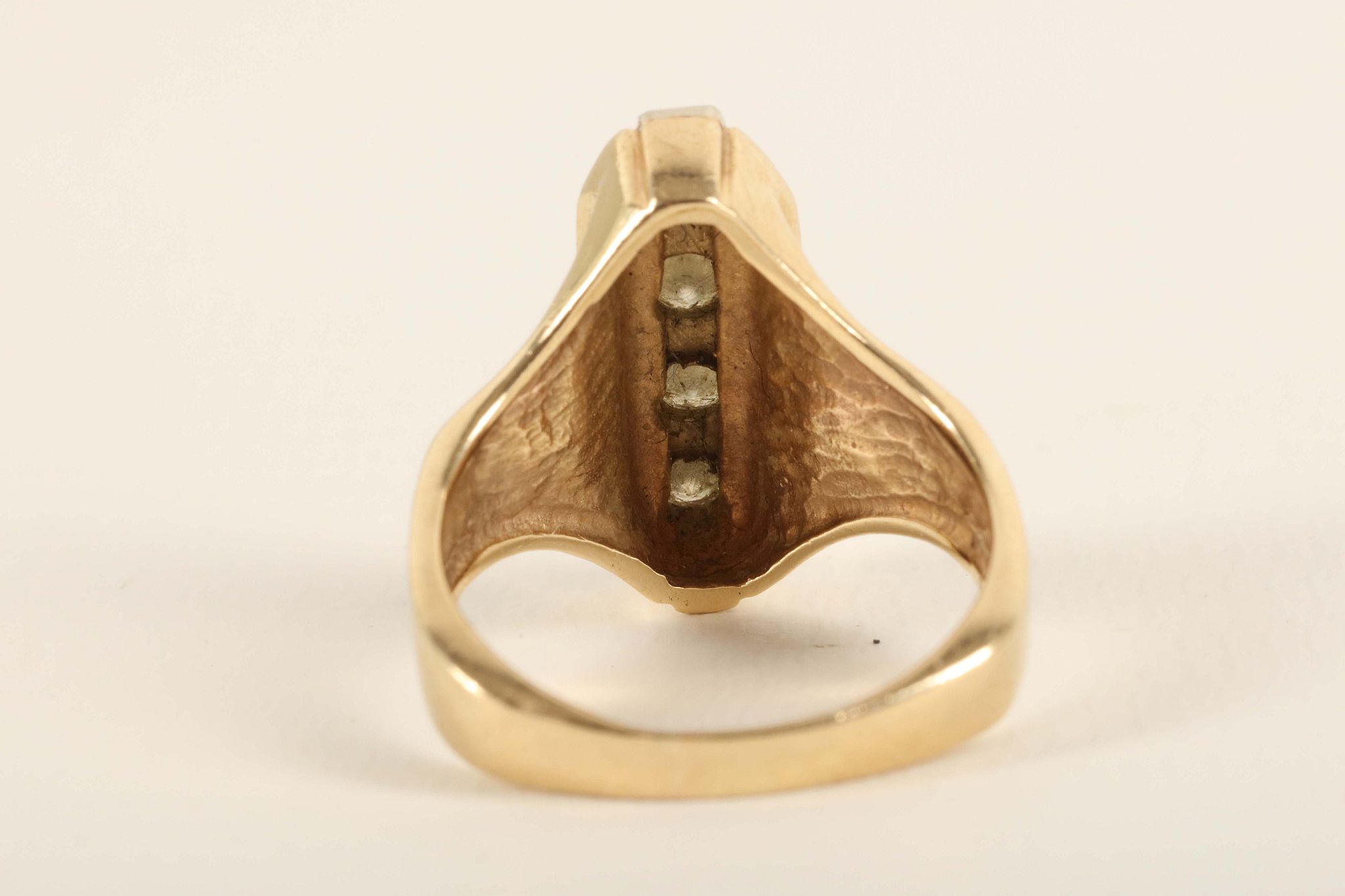 A diamond and yellow gold dress ring, the lozenge shaped top set with four uniform sized brilliant - Image 2 of 2