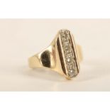 A diamond and yellow gold dress ring, the lozenge shaped top set with four uniform sized brilliant