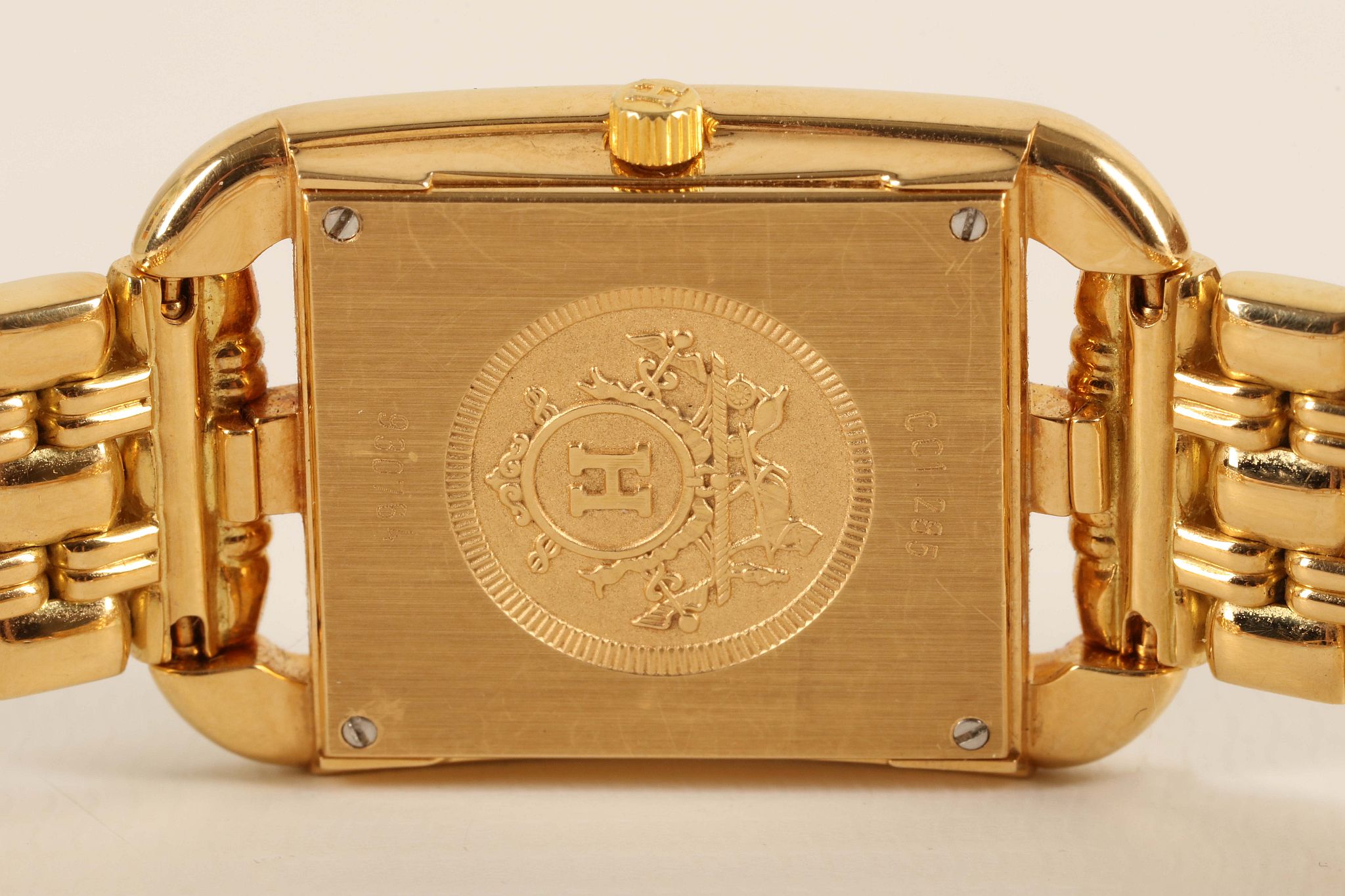 A ladies 18ct gold 'Hermes - Cape Cod' bracelet watch, with mother of pearl dial and concealed - Image 4 of 4