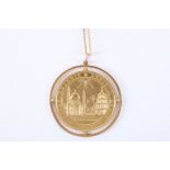 A substantial high carat gold medallion / pendant, with later 9ct gold frame mount and suspended