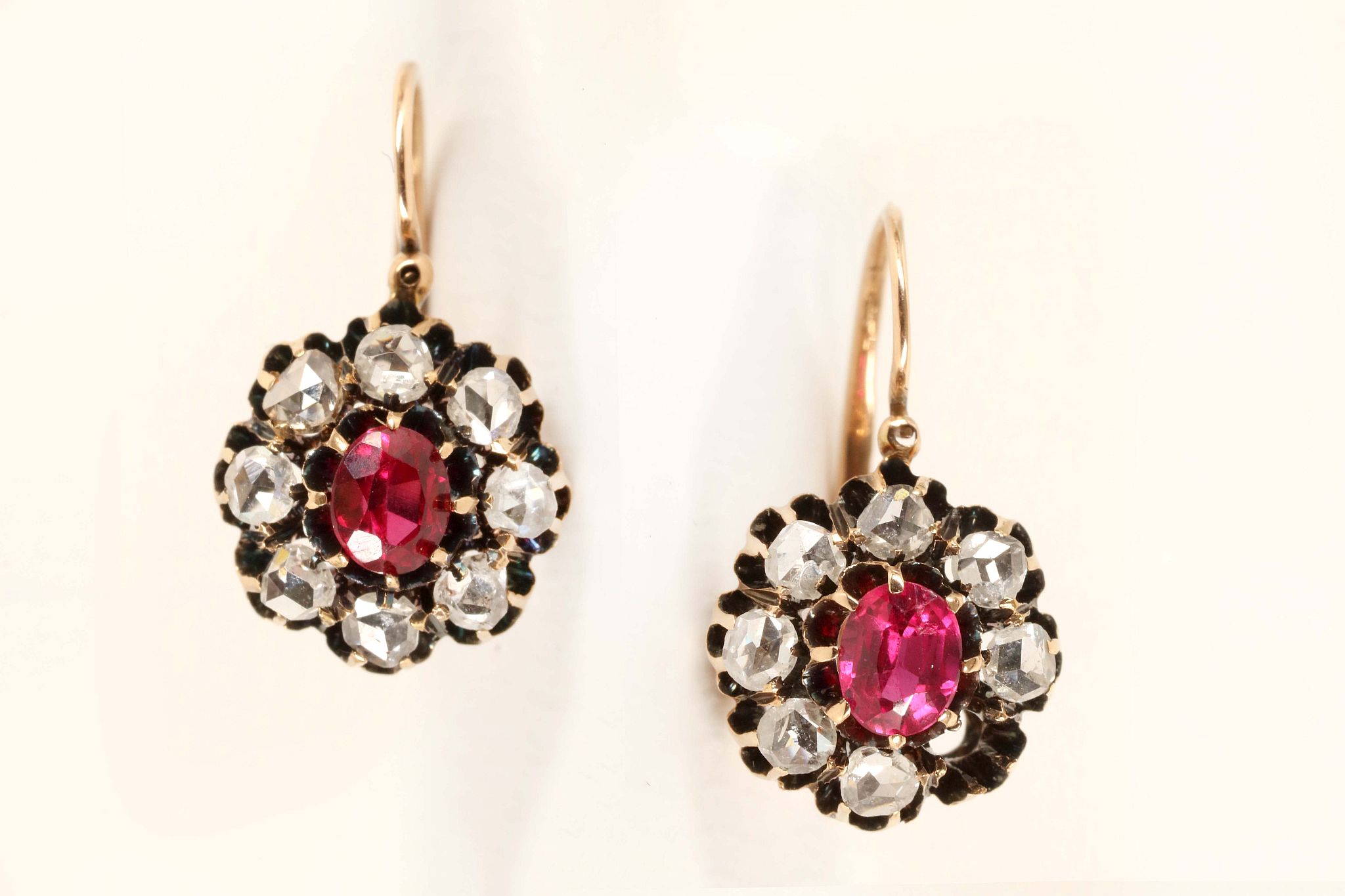 A pair of 19th Century Russian 14ct gold, synthetic ruby and diamond cluster earrings, the central