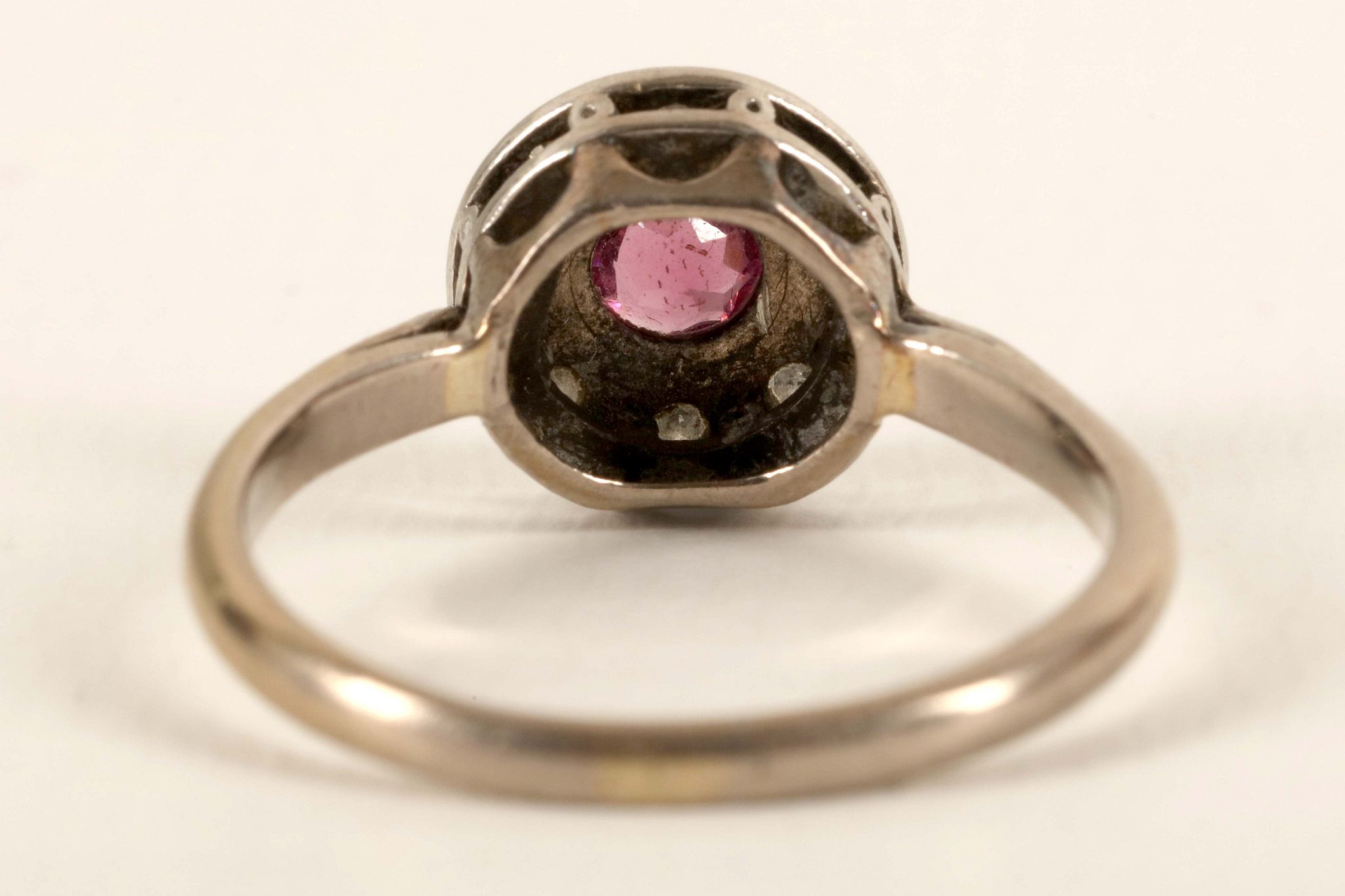 An 18ct gold, ruby and diamond cluster ring. - Image 2 of 2