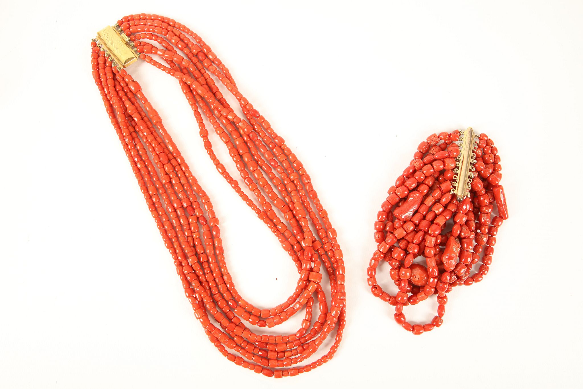 A triple strand Sardinian coral bead necklace with 18ct gold slide clasp, sold together with a 9