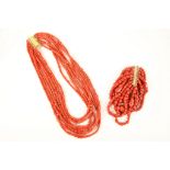 A triple strand Sardinian coral bead necklace with 18ct gold slide clasp, sold together with a 9