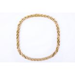 An 18ct yellow gold triple brick link necklet, set with 228 brilliant round cut diamonds and sold