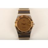 A gent's two tone stainless steel and 18ct gold 'Omega Constellation' automatic wristwatch, with