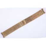 A gent's vintage Swiss 18ct gold brick link dress watch bracelet with fold-over clasp. Length: 16cm.