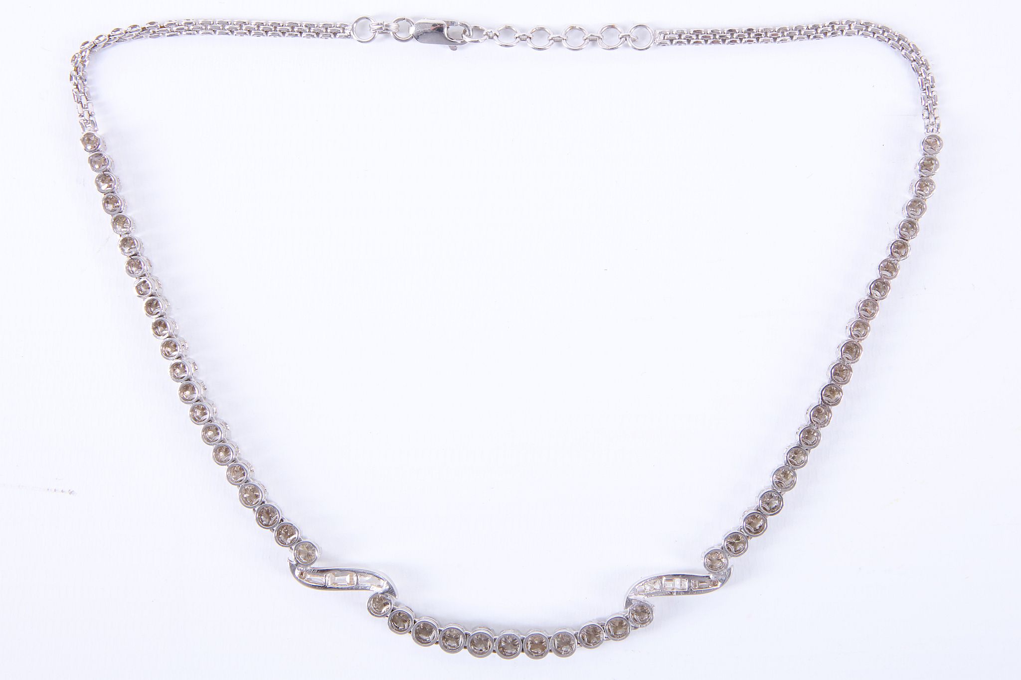 A 14ct white gold and diamond set necklace, the 53 graduated brilliant round cut stones interspersed - Image 5 of 5