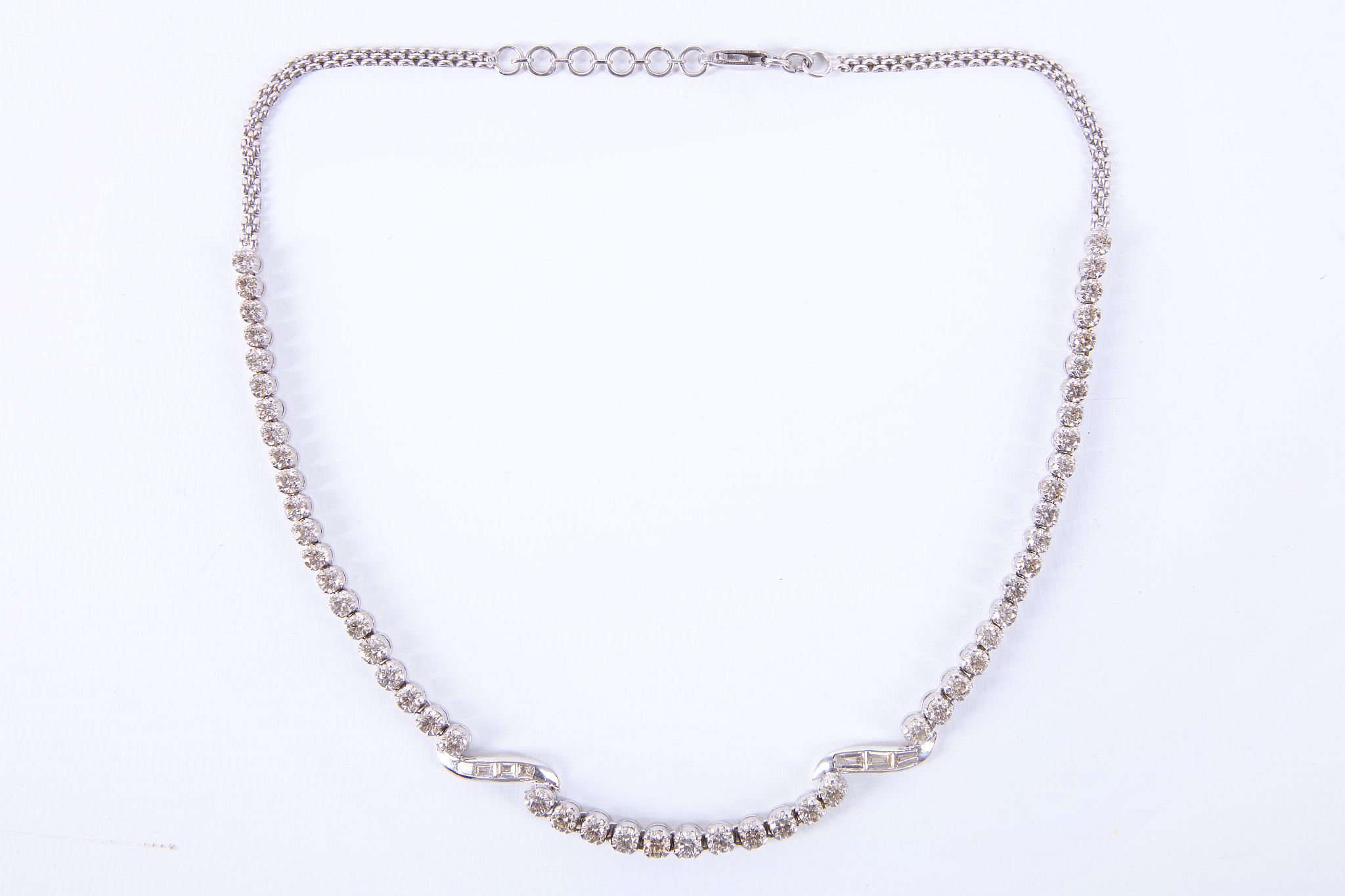 A 14ct white gold and diamond set necklace, the 53 graduated brilliant round cut stones interspersed - Image 3 of 5