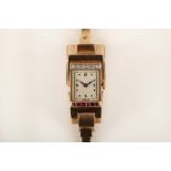 A ladies c.1940's 6ct gold cocktail watch, the silvered dial having quarter Arabic numerals,