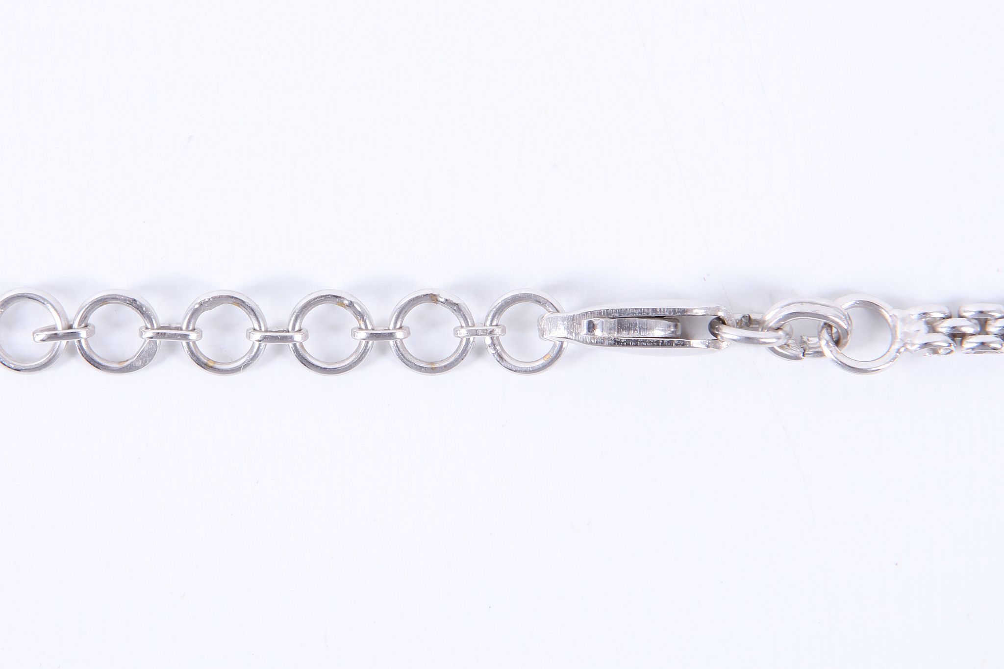 A 14ct white gold and diamond set necklace, the 53 graduated brilliant round cut stones interspersed - Image 4 of 5