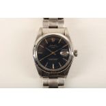 A gent's c.1975 stainless steel cased 'Rolex Oyster Perpetual-Date' wristwatch, with black dial,