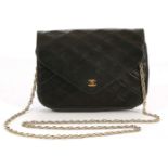 VINTAGE CHANEL FLAP HANDBAG, pre-serialisation, black quilted leather with pointed flap and gilt