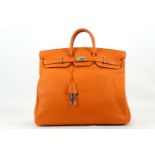 RARE HERMES ORANGE CLEMENCE HAUT A COURROIE BIRKIN 50, date code for 2003, palladian hardware,