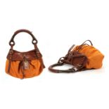 HUGO BOSS HANDBAG, orange perforated suede with brown leather trim and wooden handle, 36cm wide,