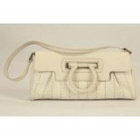 SALVATORE FERRAGAMO WHITE LEATHER HANDBAG, with oversized leather covered closure, vertical stitched