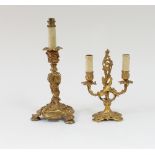 A French 19th Century ormolu twin-branch candelabrum in the Rococo style with scrolling acanthus