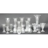 A collection of seventeen cut and plain glass flower vases/Provenance: Plas Gwyn,