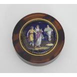 A tortoiseshell circular box, the lid enamelled with a Classical scene, 7.