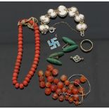 A single strand of graduated coral beads, a cameo bracelet, a seed pearl and enamel brooch, etc.