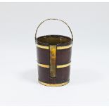 A George III mahogany plate bucket with three brass bands, loop handle and a later brass liner,