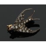 A small diamond set brooch of swallow form Condition Report: Approx 2.5gm.  Late Victorian/